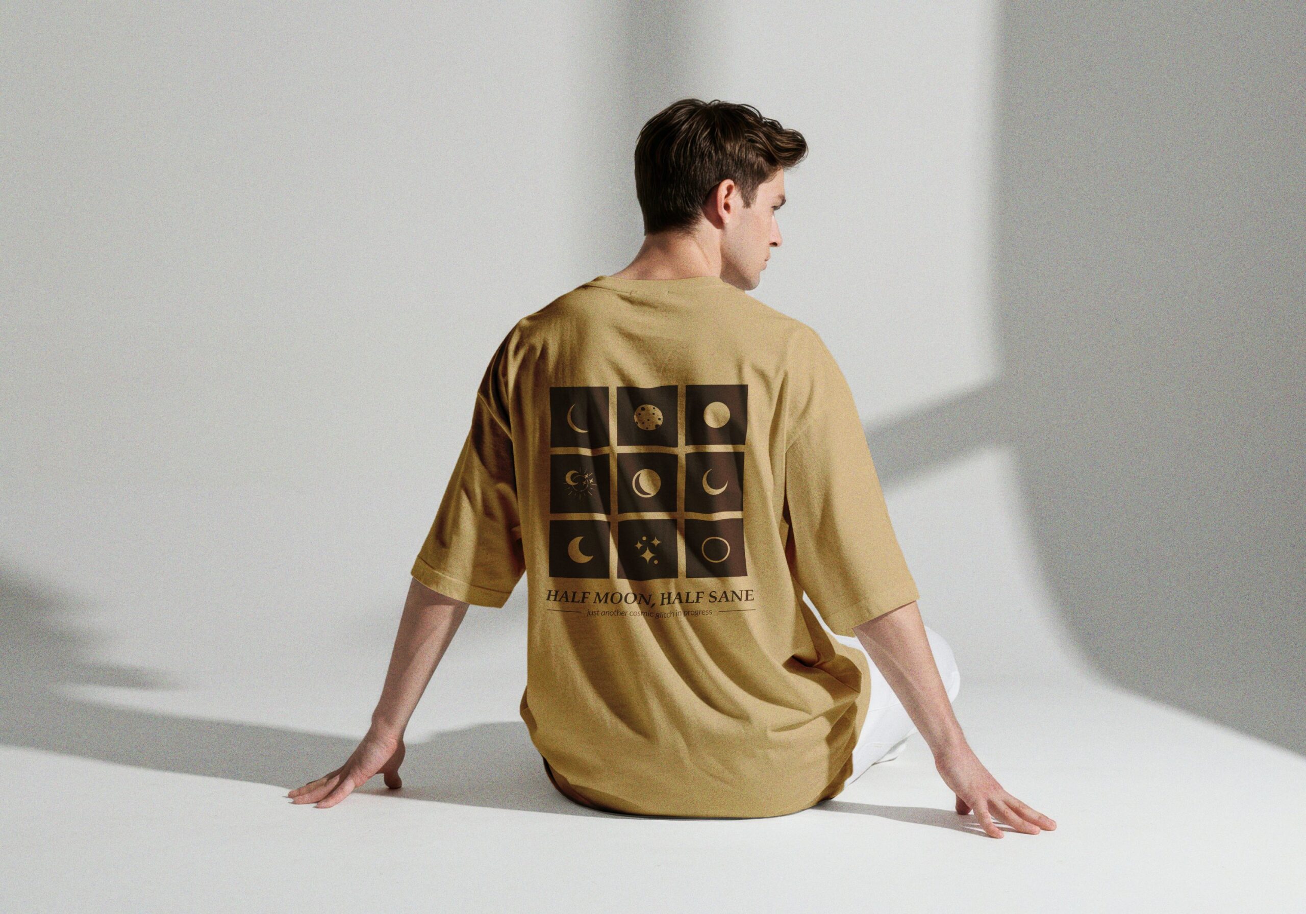 2026/01/1000098552-scaled.jpg Half Moon, Half Sane Tee - Light Camel - Image 1